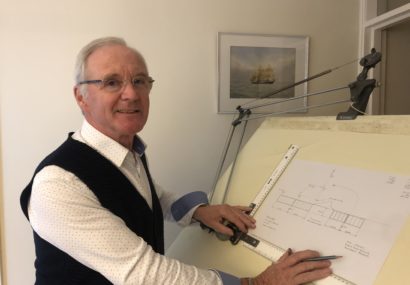 Peter Morrey, chairman and owner of Terry Lifts pictured at his drawing board